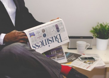 Businessman Read Newspaper